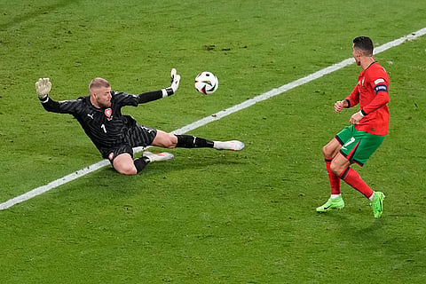  Jindrich Stanek stops a shot by Cristiano Ronaldo 